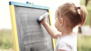 children working on a verticle surface